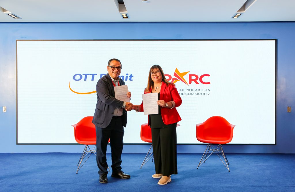 man and woman during launch of partnership for filipino-canadian communities